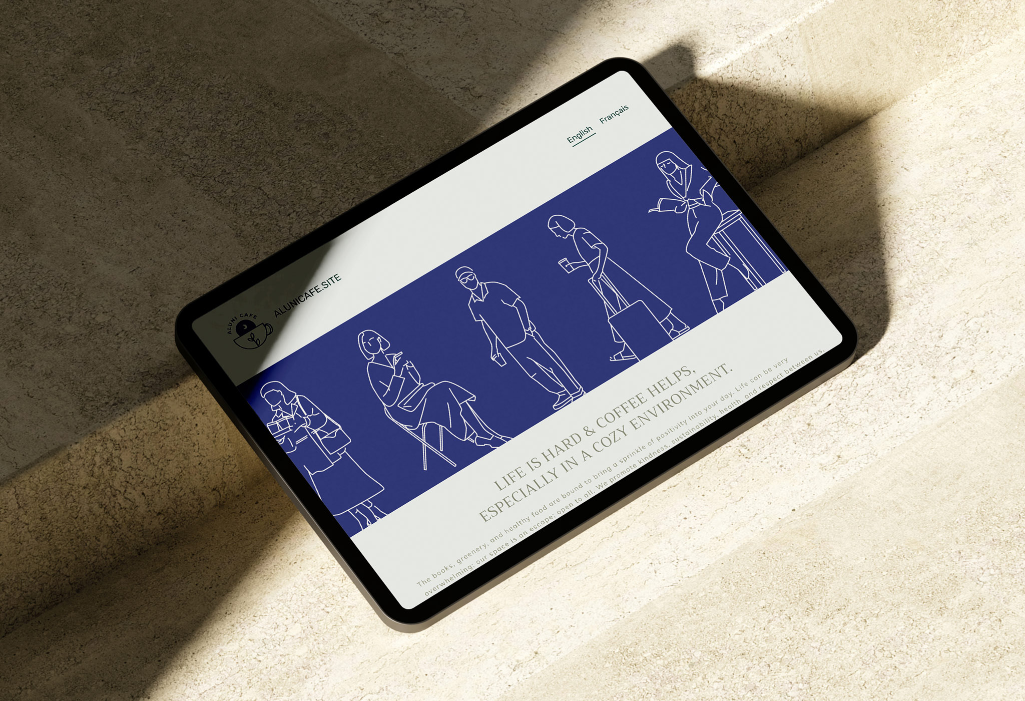 Mockup of my Aluni Cafe website design displayed on a tablet device. The mockup shows illustrations and a bit of text below.