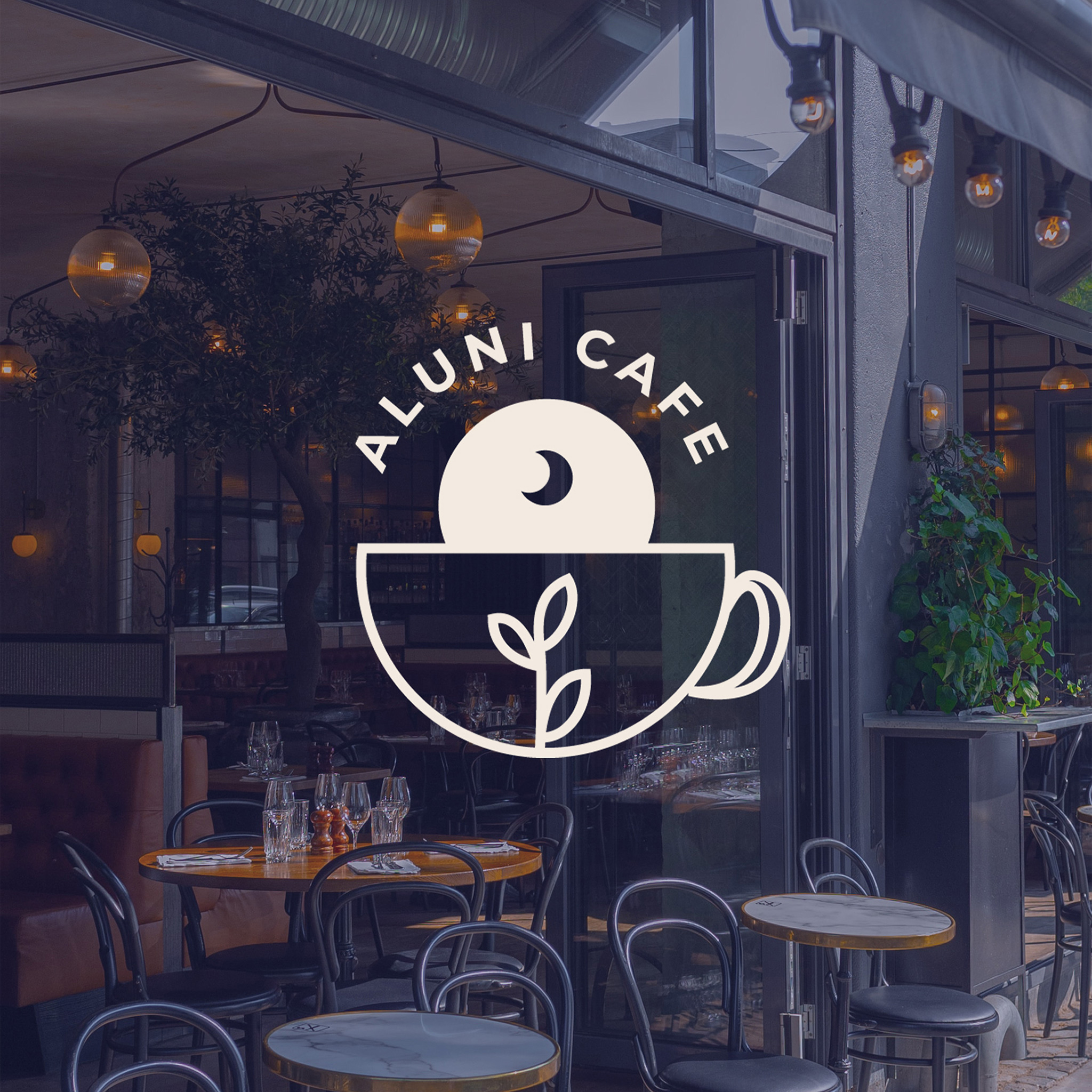 Aluni Cafe logo displayed over an image of a coffee shop with a colored overlay.